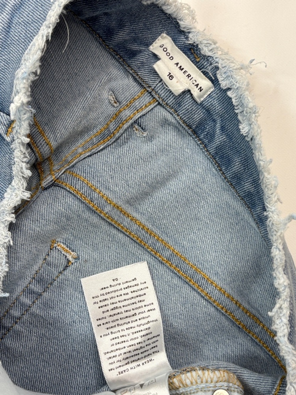 GOOD AMERICAN LIGHT BLUE FLARE JEANS WITH RAW HEM! - Picture 2 of 10